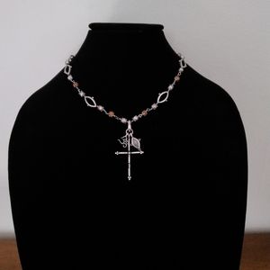 Cute Vintage cross necklace with an Om charm attached by Lucky